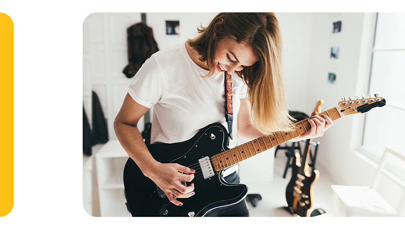 Person playing the guitar